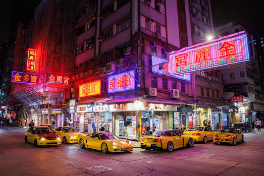 Yellow Hondas under neon lights in Hong Kong (24x36)